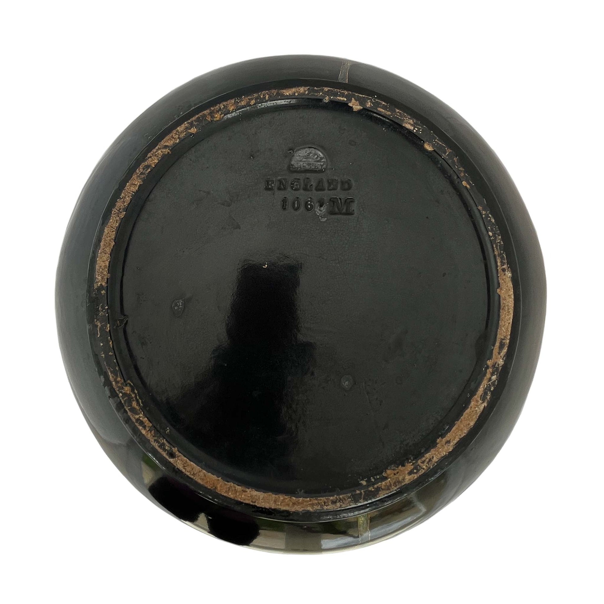 large black jardiniere base with makers mark