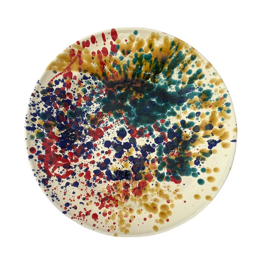 Nicola Fasano large ceramic platter with multicoloured splatter pattern. Seen from above.