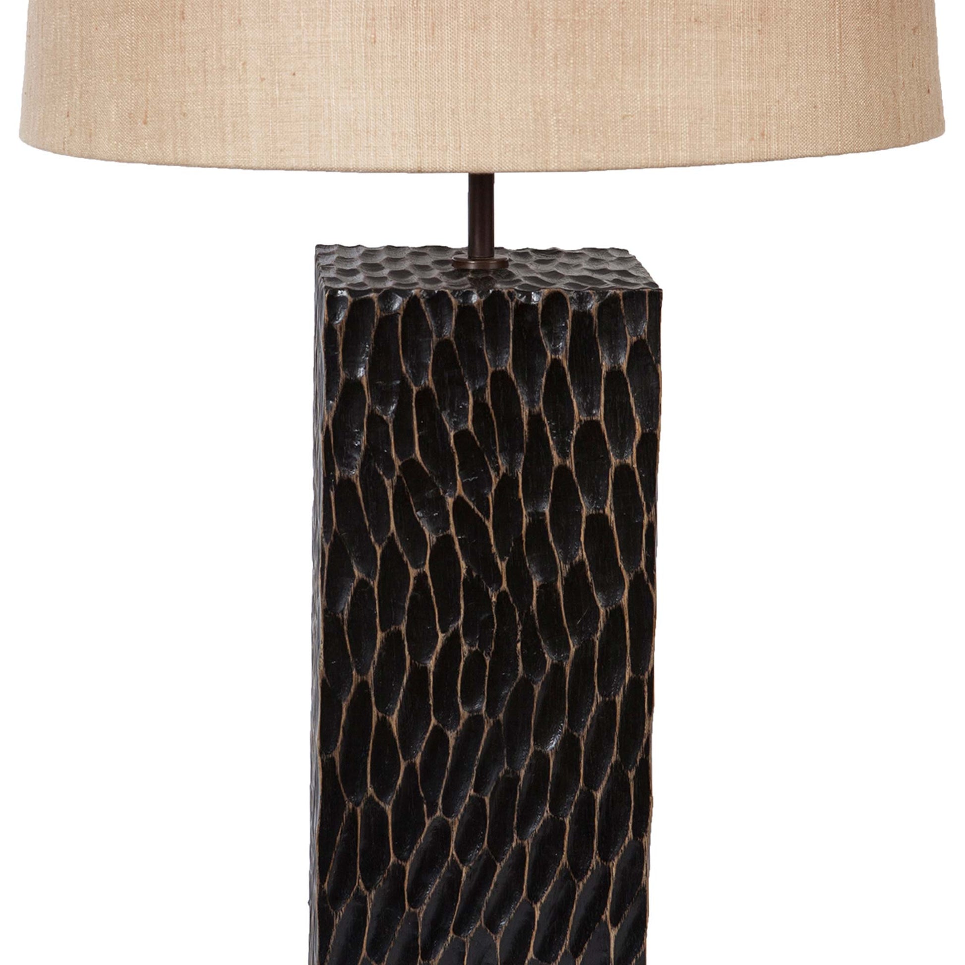 close up of black oak lamp base showing the textured carved detail and varnished finish