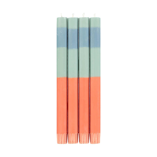 Four tall dinner candles. Striped pale green, orange, and pale blue candles