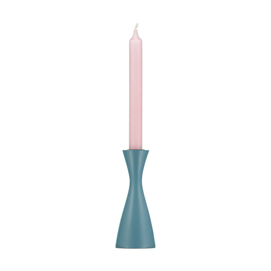 Minimal plain blue candleholder with tall pale pink dinner candle