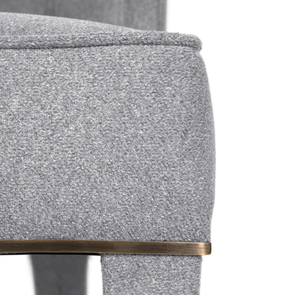 close up image showing the rich cotton velvet fabric and aged brass details