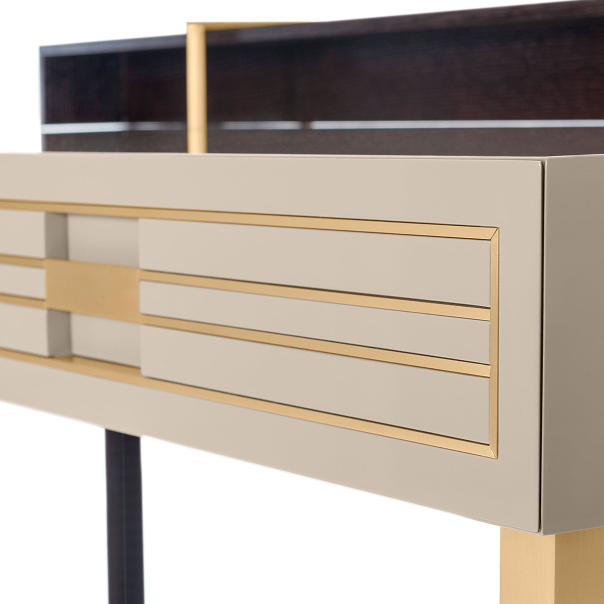 Solid wood designer desk with drawers and with brushed brass details.