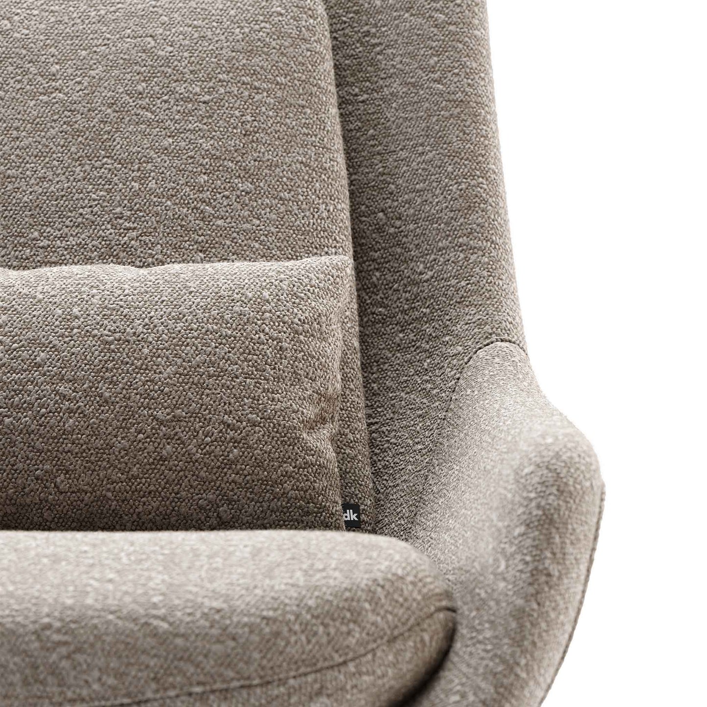 Close up of modern egg shaped swivel chair with oatmeal coloured upholstery on pedestal steel base.