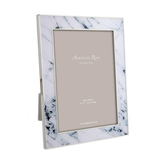 White marble with black veins and silver photo frame