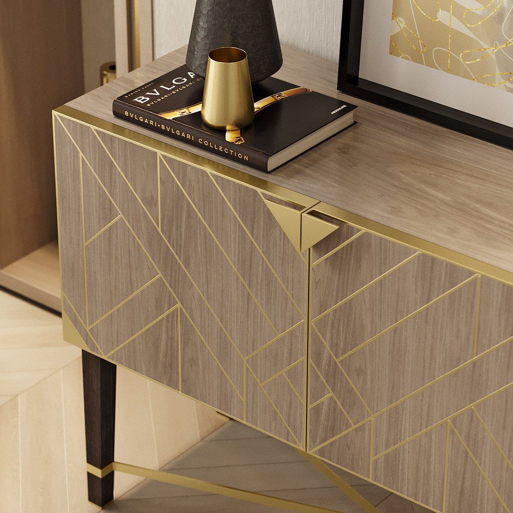 Lifestyle image of luxury four door sideboard with modern diagonal brass inlay and dark wood legs and brass details.