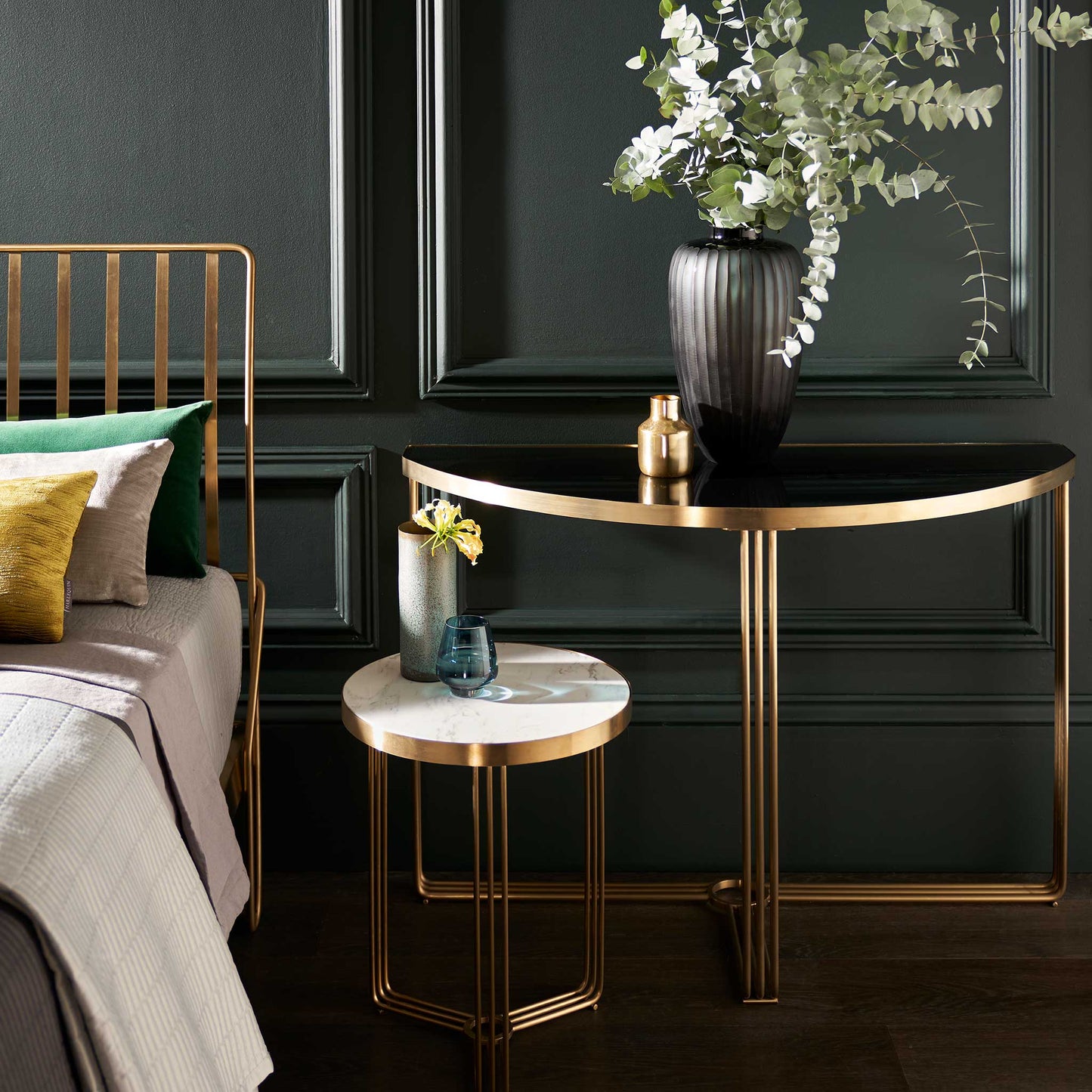 Gold small side table in luxury bed room