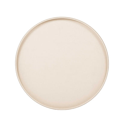 View from above of large round cream luxury Italian leather tray