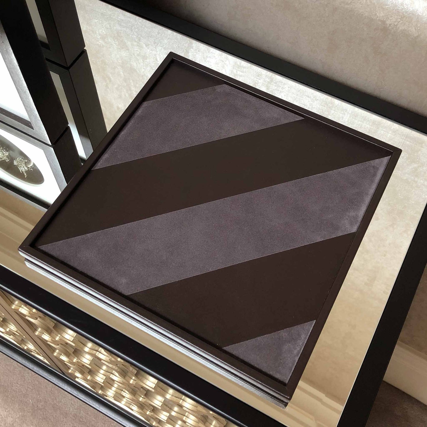 nappa leather suede diagonal valet tray on a mirror dresser