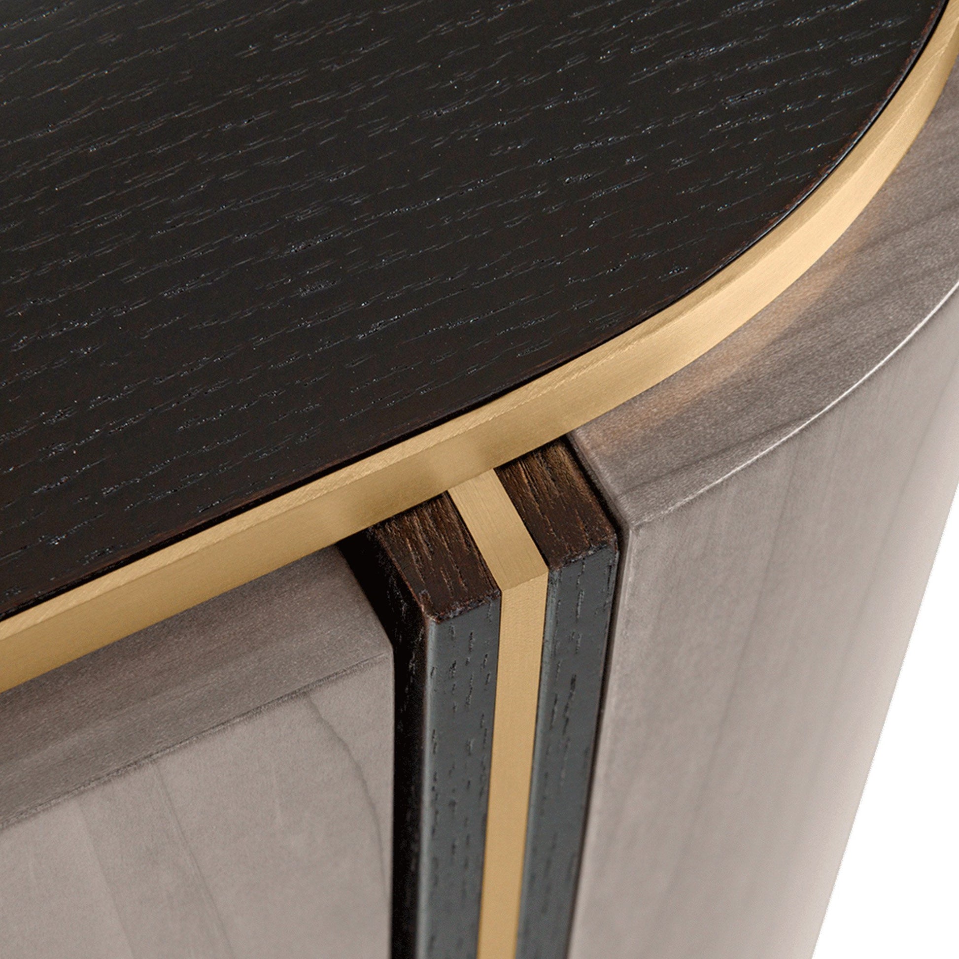 Close up of sleek and minimal two tone wood bedside table with brass inlay