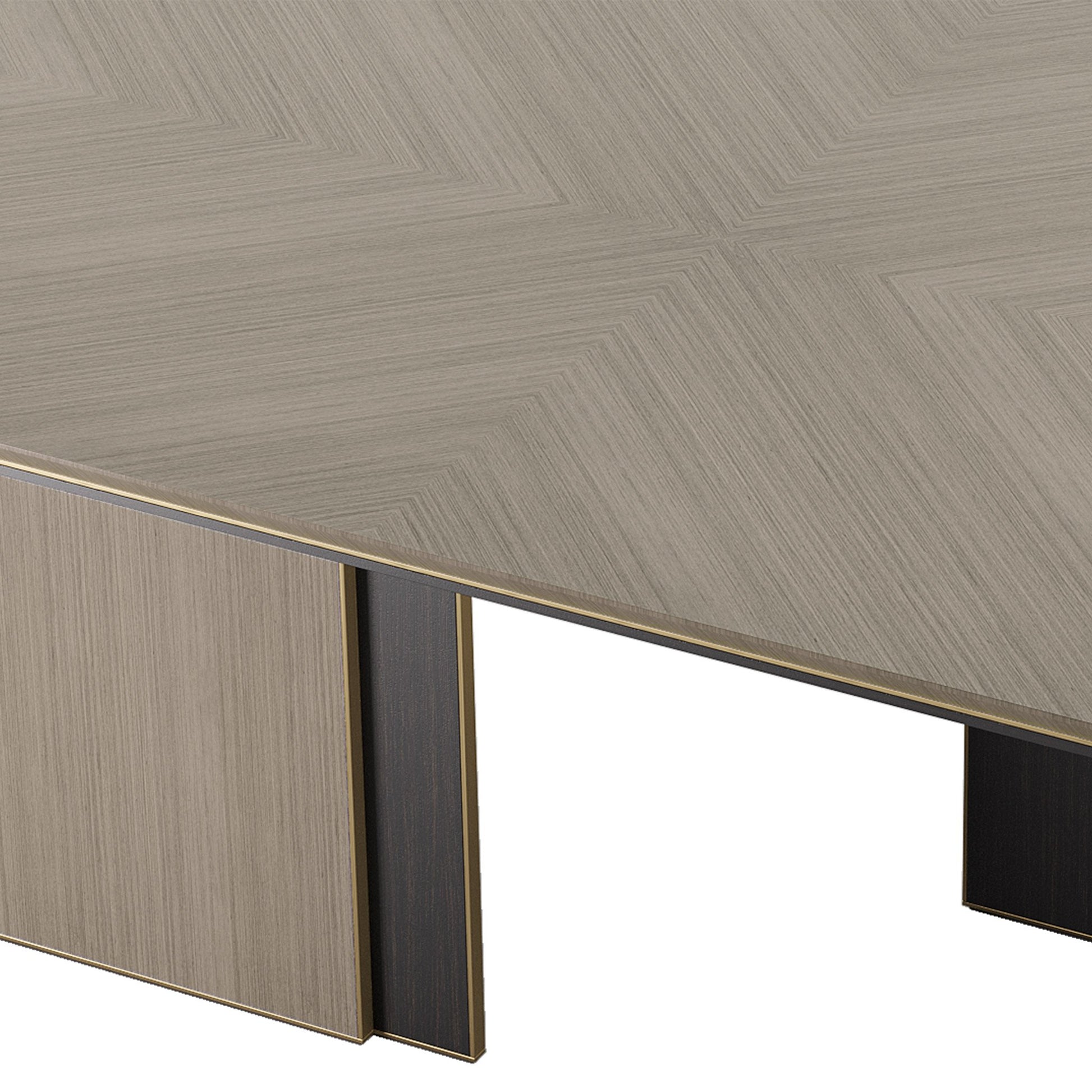 Oval wooden dining table in  in a high gloss close pore wood veneer and brass details.