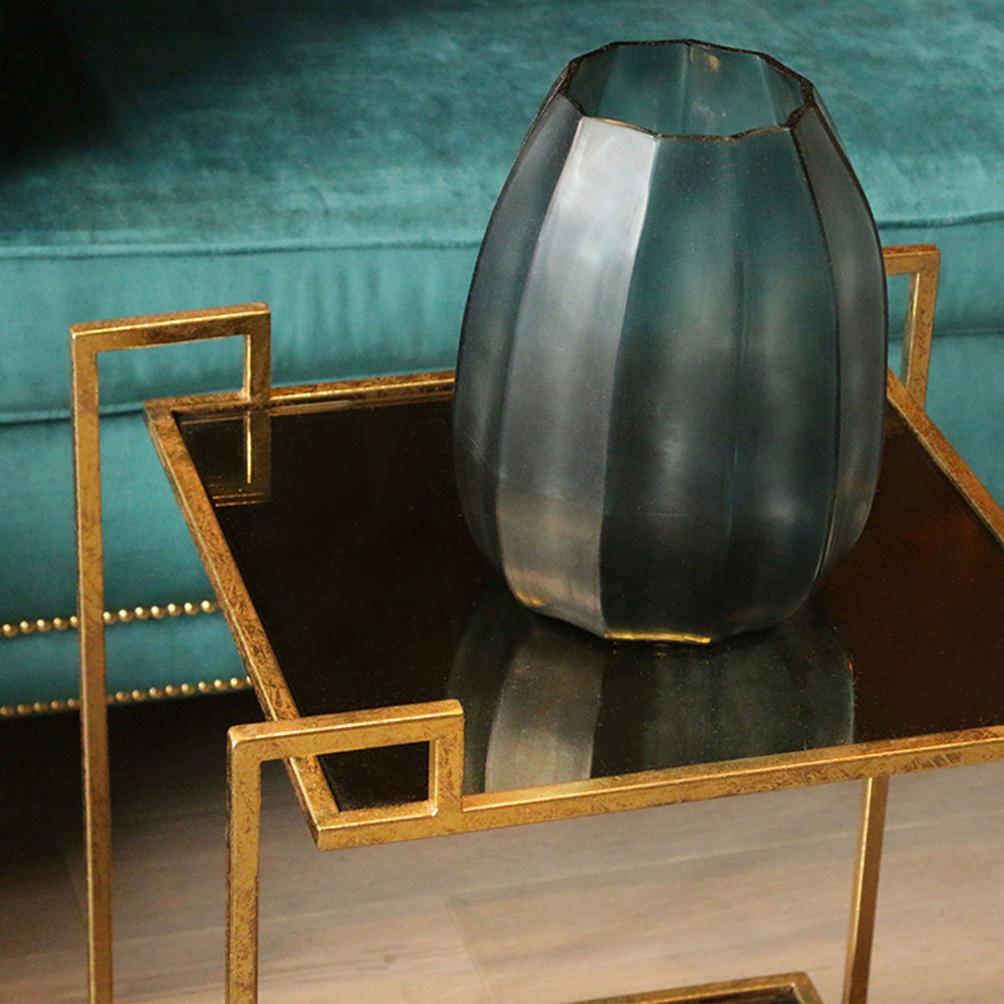 Two-tier iron square table with mirror in luxurious house