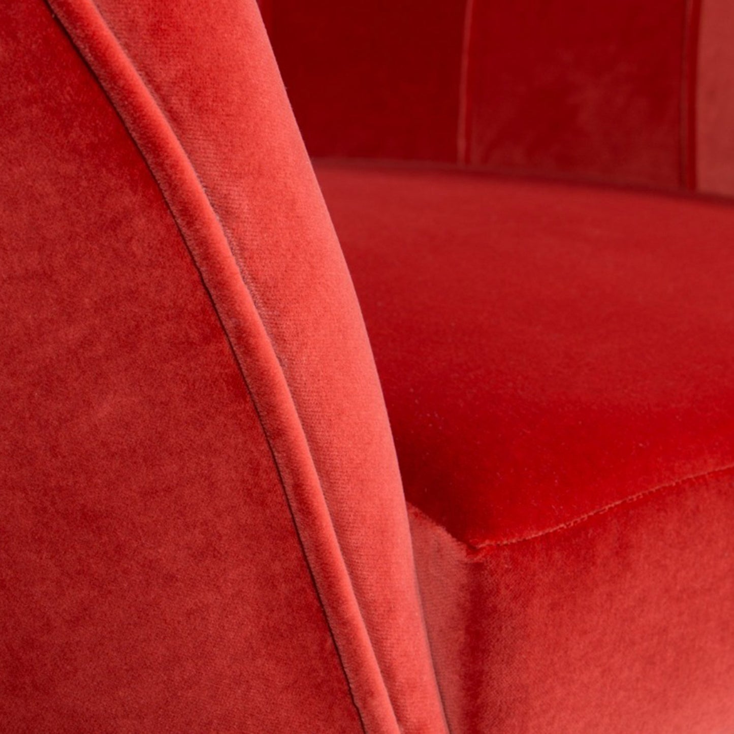 Close up view showing the rich cotton velvet upholstery of the armchair